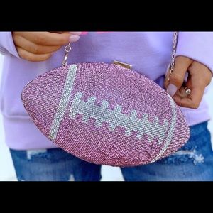 Pink football rhinestone purse